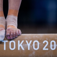 A gymnast takes part in a training session ahead of the Tokyo 2020 Olympic Games.  | AFP-JIJI
