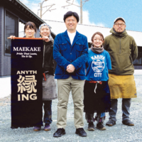 Kazuhiro  Nishimura (center), president of Anything Co. Ltd., with his staff outside the Anything factory in Toyohashi, Aichi Prefecture | ANYTHING @MAEKAKEANYTHING