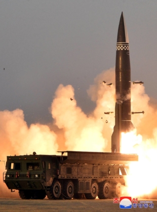 A newly developed North Korean missile is launched on March 25. | KCNA / VIA REUTERS 