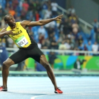 Usain Bolt does his famous lightning-bolt pose at the Rio de Janeiro Olympics in August 2016.   | REUTERS