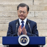 South Korean President Moon Jae-in\'s decision to forgo attending the Tokyo Olympics, thereby missing a chance to meet with Prime Minister Yoshihide Suga, has highlighted the increasingly low prospects that the two neighbors can quickly bridge their differences. | POOL / VIA REUTERS