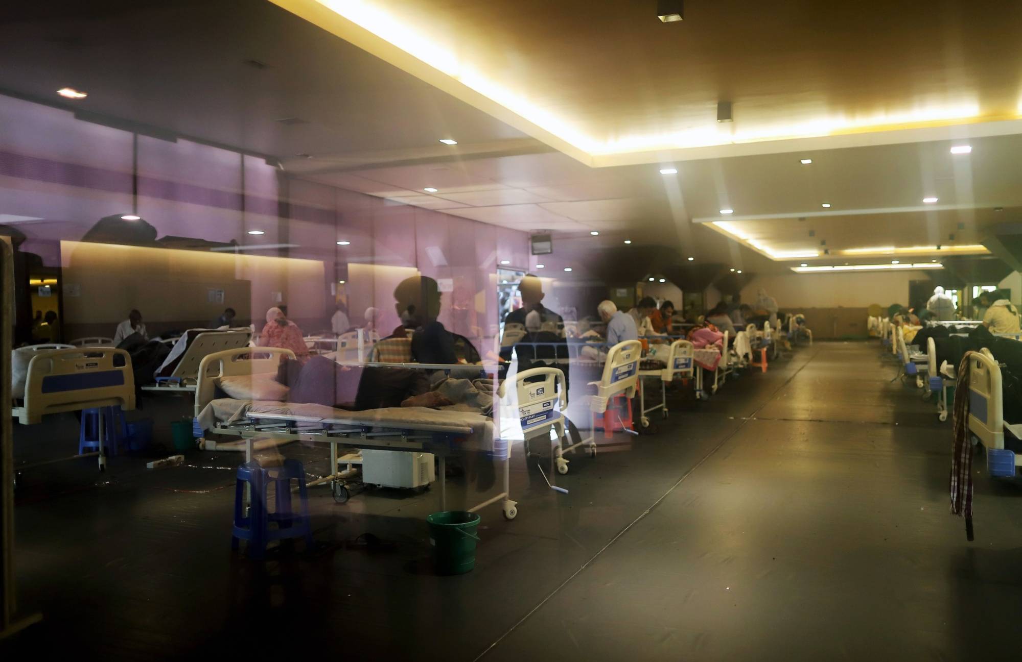 A makeshift COVID-19 quarantine facility set up at a banquet hall in New Delhi in April | Bloomberg 