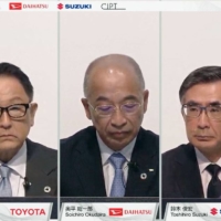 Toyota Motor Corp. President Akio Toyoda (left), Daihatsu Motor Co. President Soichiro Okudaira (center) and Suzuki Motor Corp. President Toshihiro Suzuki hold an online news conference on Wednesday. | KYODO