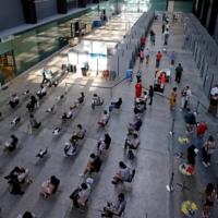 A temporary COVID-19 vaccine center at the Tate Modern in central London on July 16 | AFP-JIJI