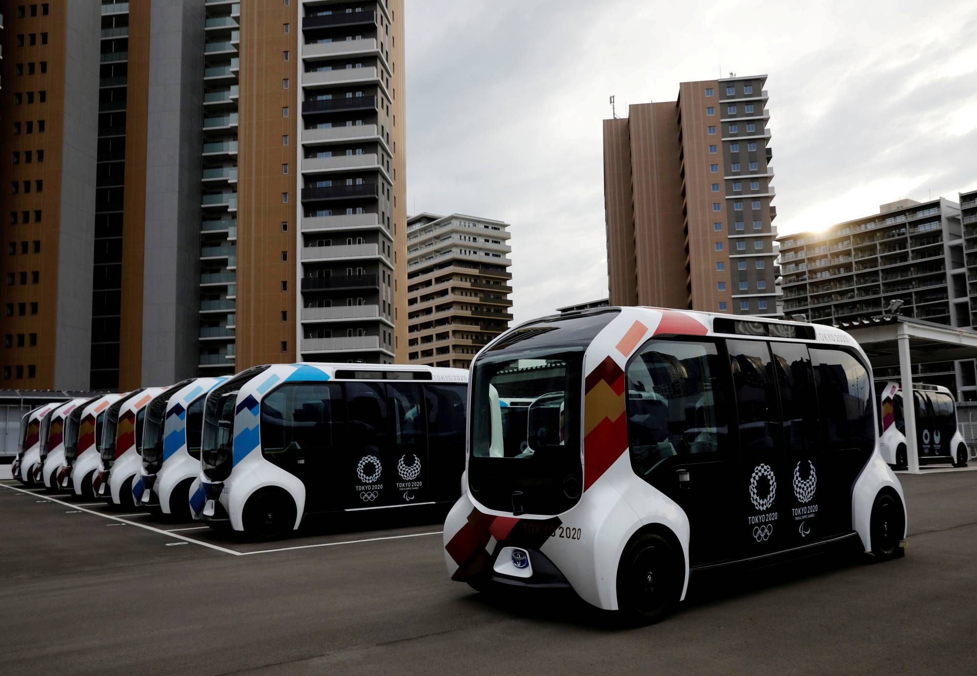 Electric vehicles are used for internal shuttle services at the athletes' village for the Tokyo Olympic and Paralympic Games. | REUTERS