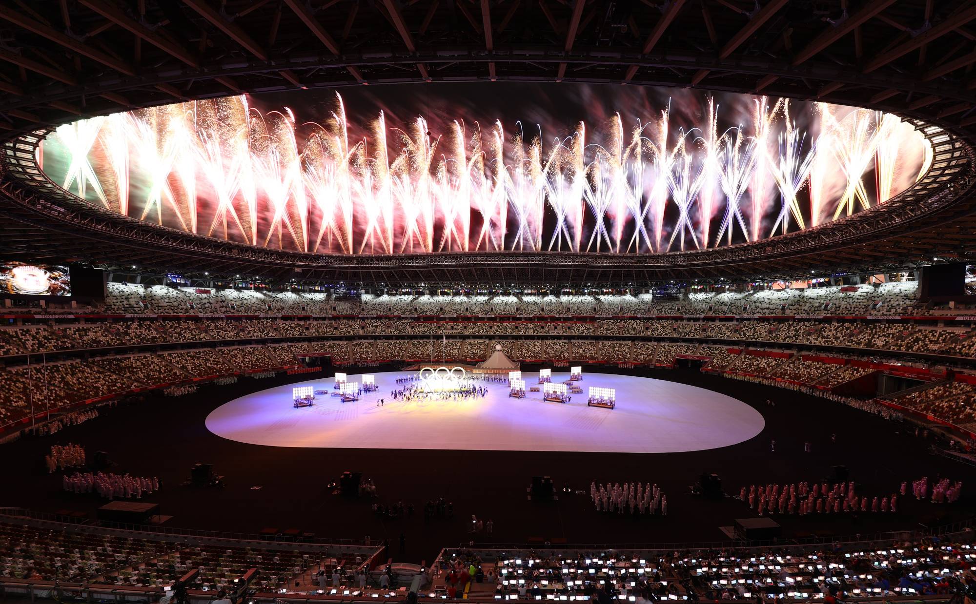 PIX: Olympic rings illuminated upon return to Tokyo Bay - Rediff.com