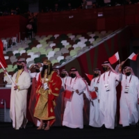 Husain Al Sayyad of Bahrain and Noor Yusuf Abdulla of Bahrain lead their team during the opening ceremony of the 2020 Tokyo Olympic Games.  | REUTERS