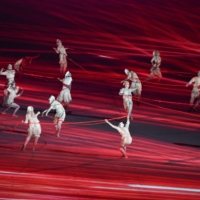 Dancers perform during the opening ceremony of the Tokyo 2020 Olympic Games at the National Stadium. | BLOOMBERG