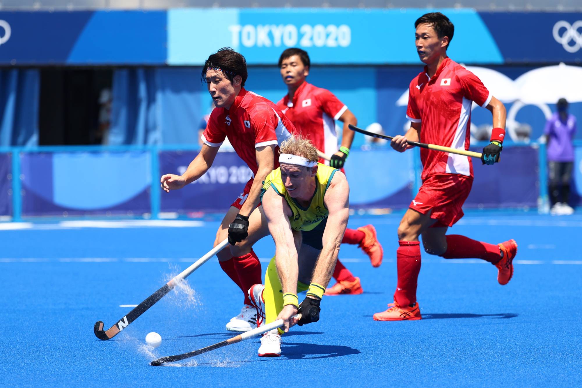 Australia tops Japan in thrilling mens hockey opener