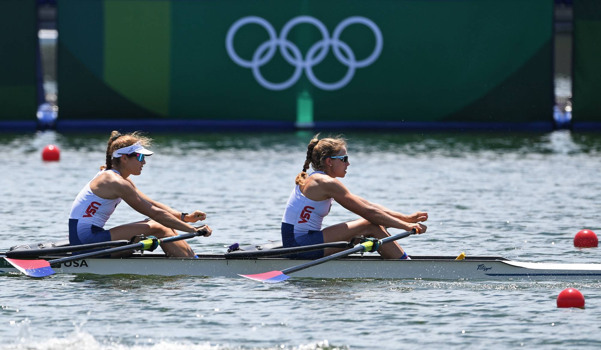 Kristina Wagner and Genevra Stone of the United States in action at Sea Forest Waterway in Tokyo on Friday | REUTERS 