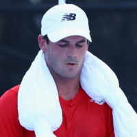 American Tommy Paul during a break in his first round match against Russian Aslan Karatsev on Saturday at Ariake Tennis Park in Tokyo.  | REUTERS