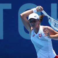\"It\'s different,\" Poland\'s Iga Swiatek said of the heat after her 6-2, 6-2 win over German Mona Barthel. \"It\'s humid. In some places in the States it was probably similar, but still, I\'m not used to it.\" | REUTERS