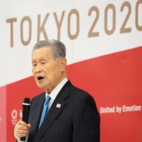Tokyo 2020 Olympics organizing committee then-chief Yoshiro Mori announces his resignation over his sexist comments, during a meeting with council and executive board members at the committee headquarters in the capital on Feb. 12. | POOL / VIA REUTERS