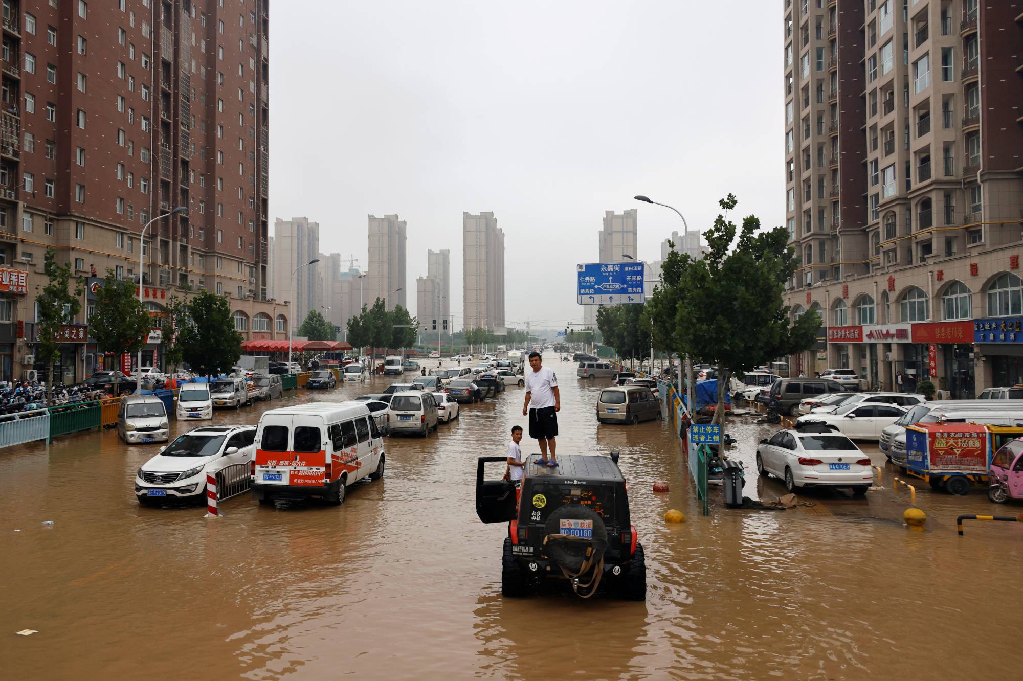 A flooded road following heavy rainfall in Zhengzhou, Henan province, China, on Friday | REUTERS 