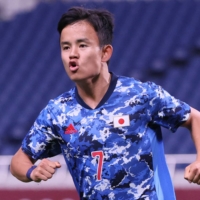 Japan\'s Takefusa Kubo celebrates after scoring his team\'s opening goal against Mexico in Saitama. | AFP-JIJI