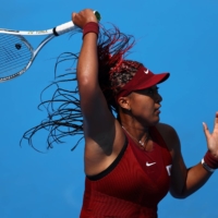 Japan\'s Naomi Osaka of Japan in action during her first round match against China\'s Zheng Saisai | REUTERS