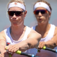 Roos de Jong and Lisa Scheenaard of the Netherlands in action in women\'s double sculls rowing on Sunday.  | REUTERS