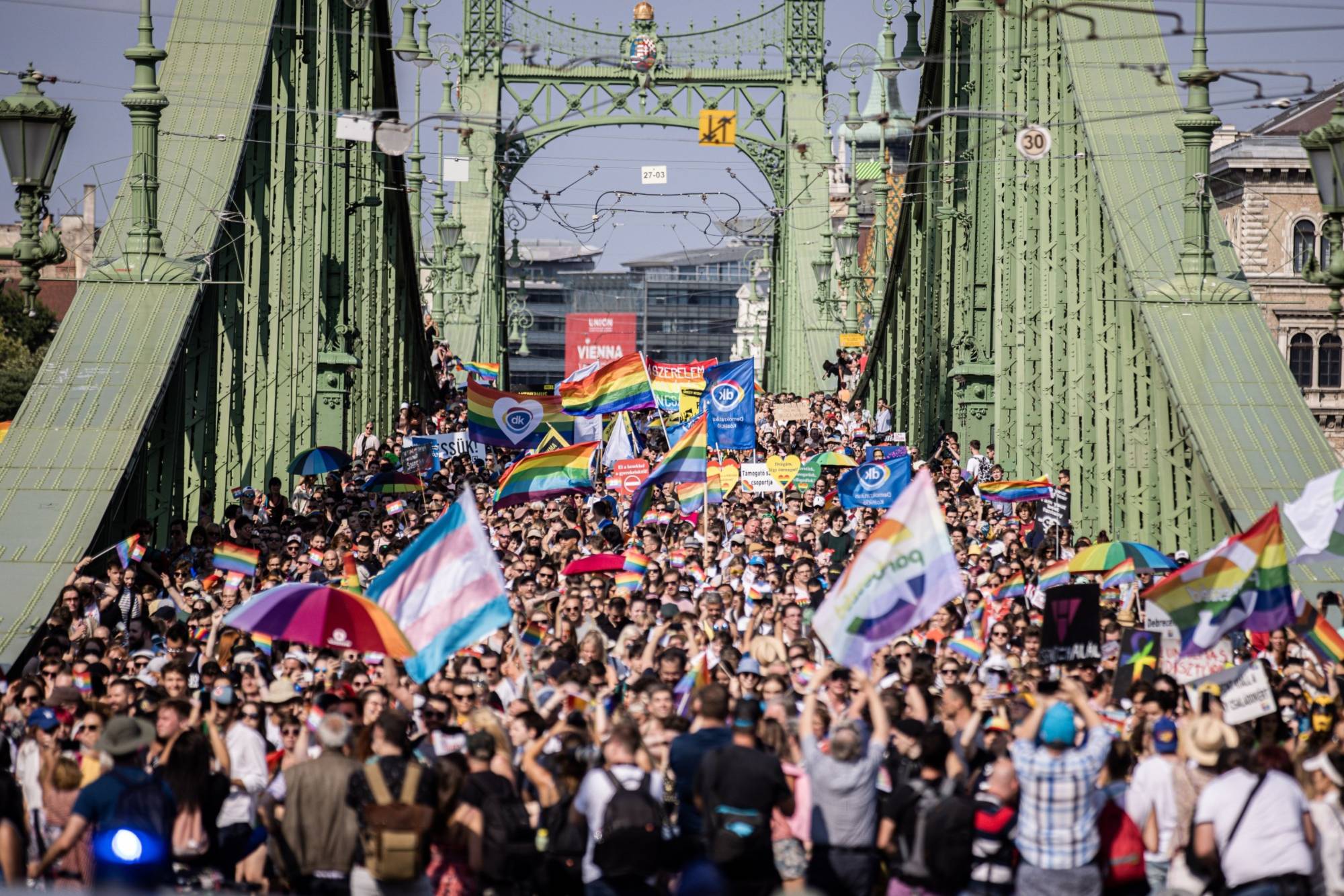 Demonstrators march during the annual Pride parade in Budapest on Saturday,. Brussels is threatening action over an LGBTQ law that could involve cutting funds to Budapest. | Bloomberg 