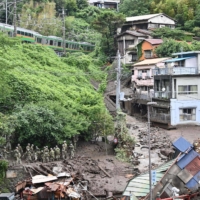 Self-Defense Forces search for missing people at a landslide in Atami, Shizuoka Prefecture, on July 5. | AFP-JIJI