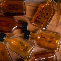 Samples of whiskey at the Milam & Greene distillery in Blanco, Texas. Milam & Greene relies on the decades of experience accumulated by Marlene Holmes, who started working at Jim Beam in the 1990s, when there were few women making whiskey. | JESSICA ATTIE / THE NEW YORK TIMES