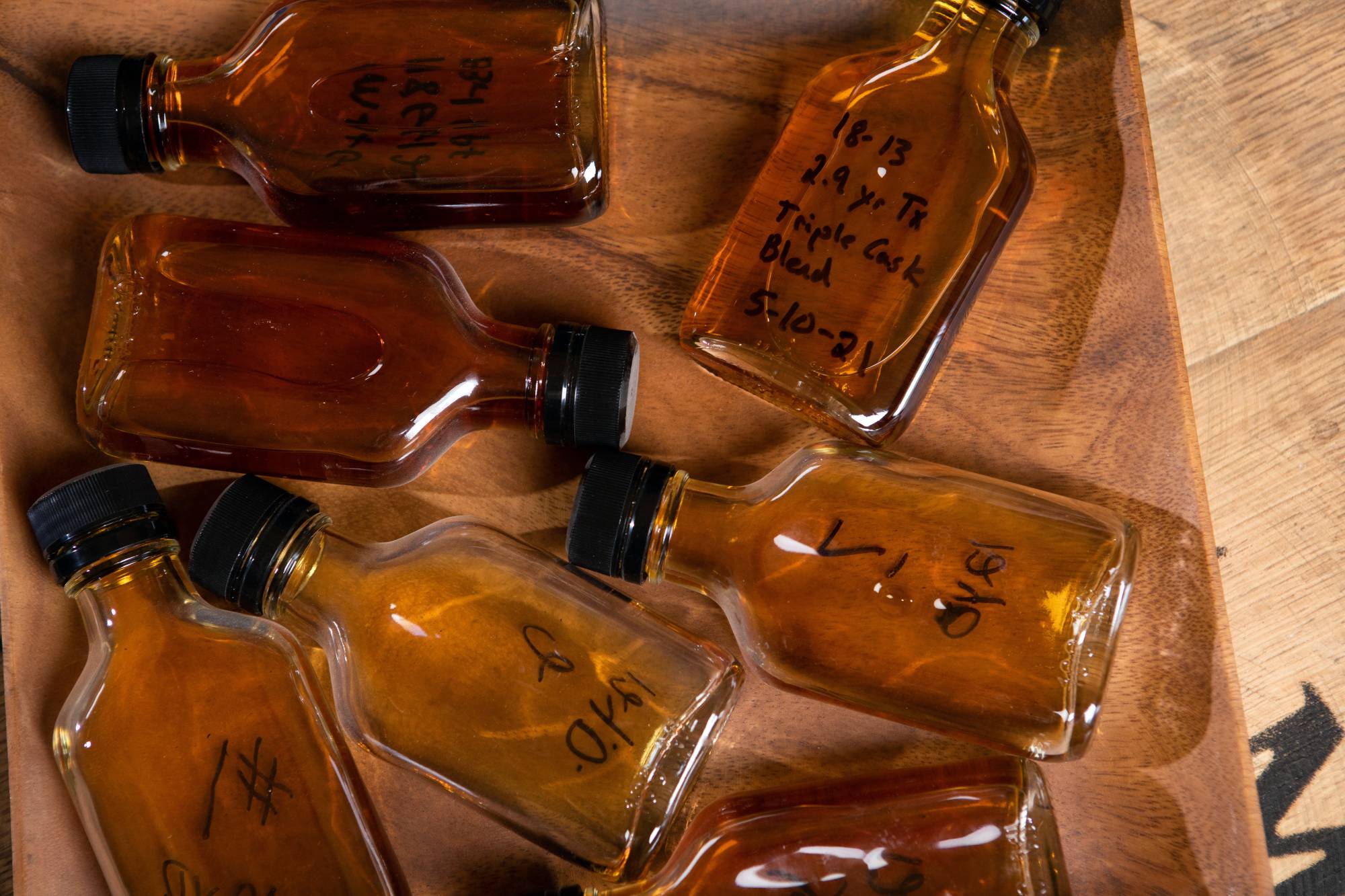 Samples of whiskey at the Milam & Greene distillery in Blanco, Texas. Milam & Greene relies on the decades of experience accumulated by Marlene Holmes, who started working at Jim Beam in the 1990s, when there were few women making whiskey. | Jessica Attie / The New York Times