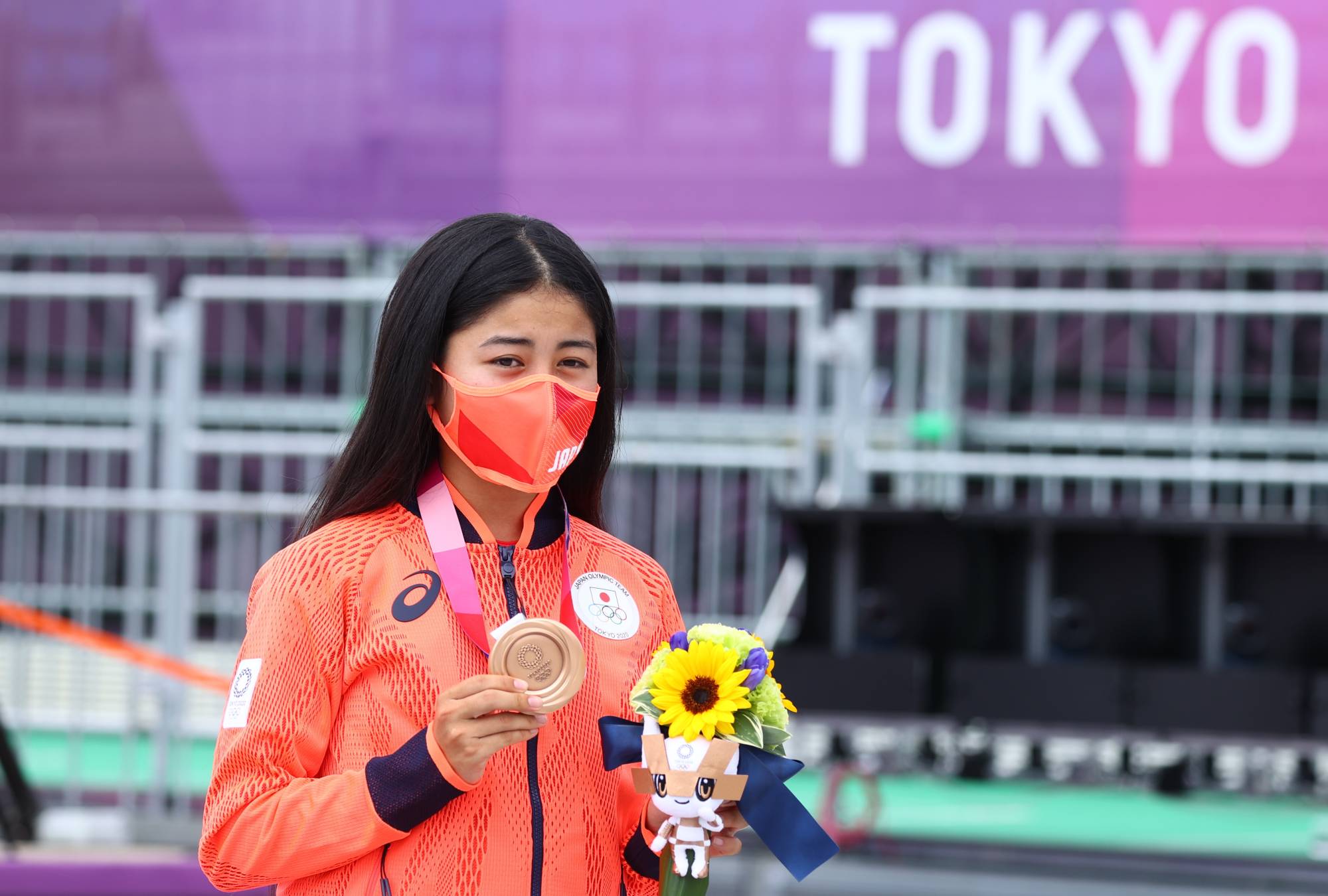 Japan's Funa Nakayama poses with her bronze medal during the medal ceremony on Monday in Tokyo. | Reuters