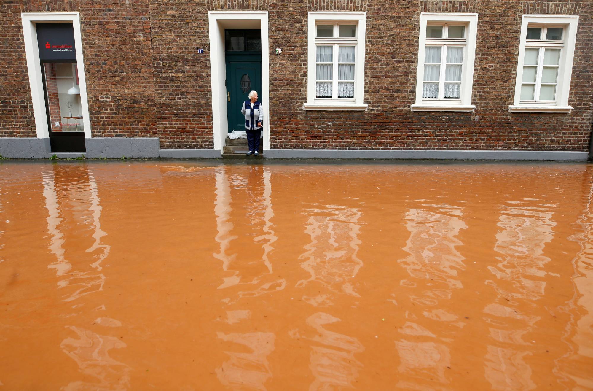 A street is flooded following heavy rainfalls in Erftstadt, Germany, on July 16. | Reuters