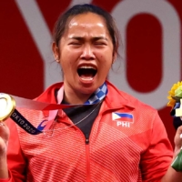 Weightlifter Hidilyn Diaz has become the Philippines\' first Olympic gold medalist. | REUTERS