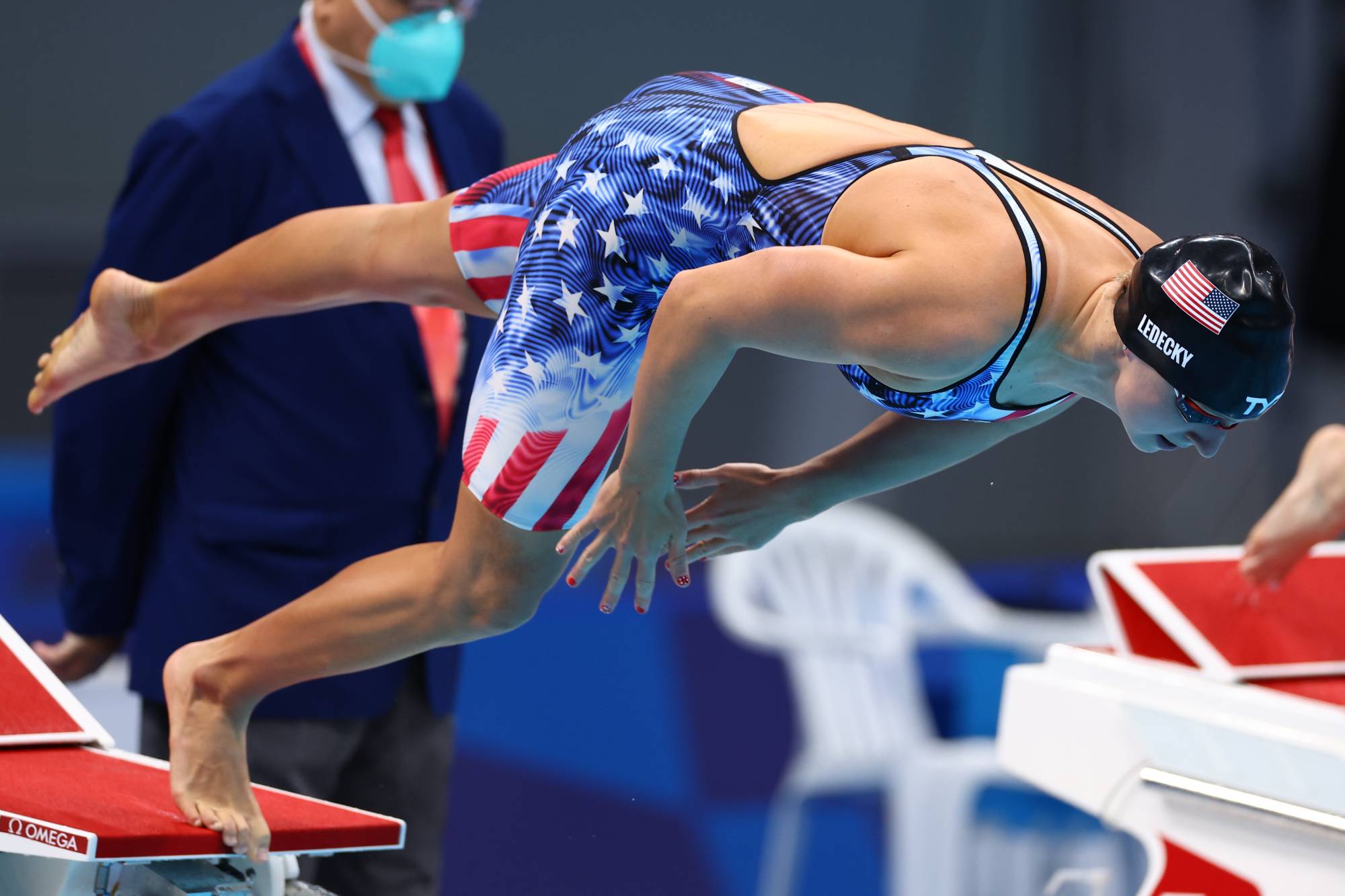 Katie Ledecky gets off the starting blocks on Tuesday at Tokyo Aquatics Centre. | Reuters