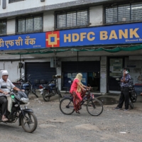 A bank branch in Jalgaon, Maharashtra, India. Repeated lockdowns have caused unemployment to soar and wiped out the savings of many households in India. | BLOOMBERG 