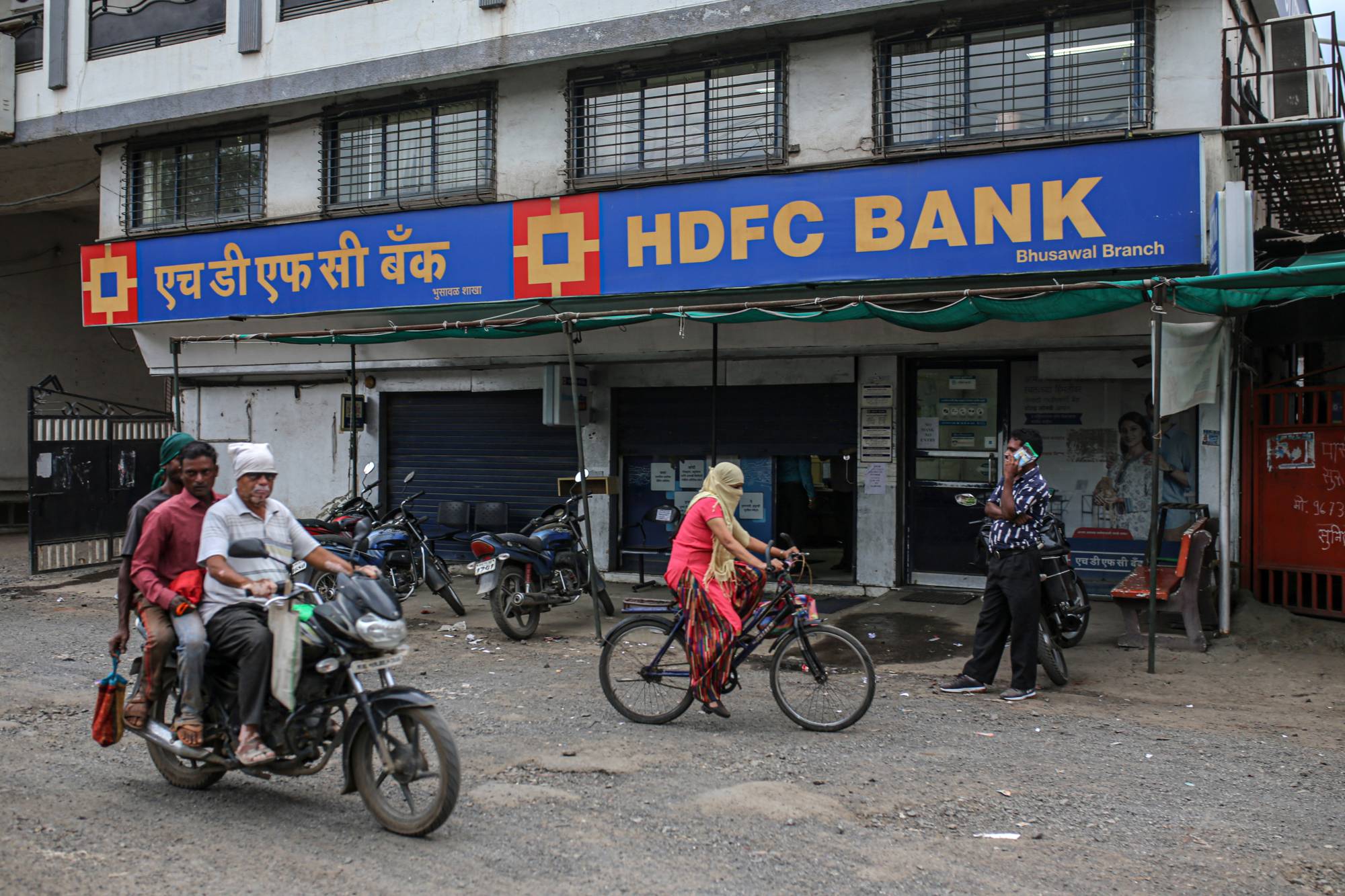 A bank branch in Jalgaon, Maharashtra, India. Repeated lockdowns have caused unemployment to soar and wiped out the savings of many households in India. | Bloomberg 