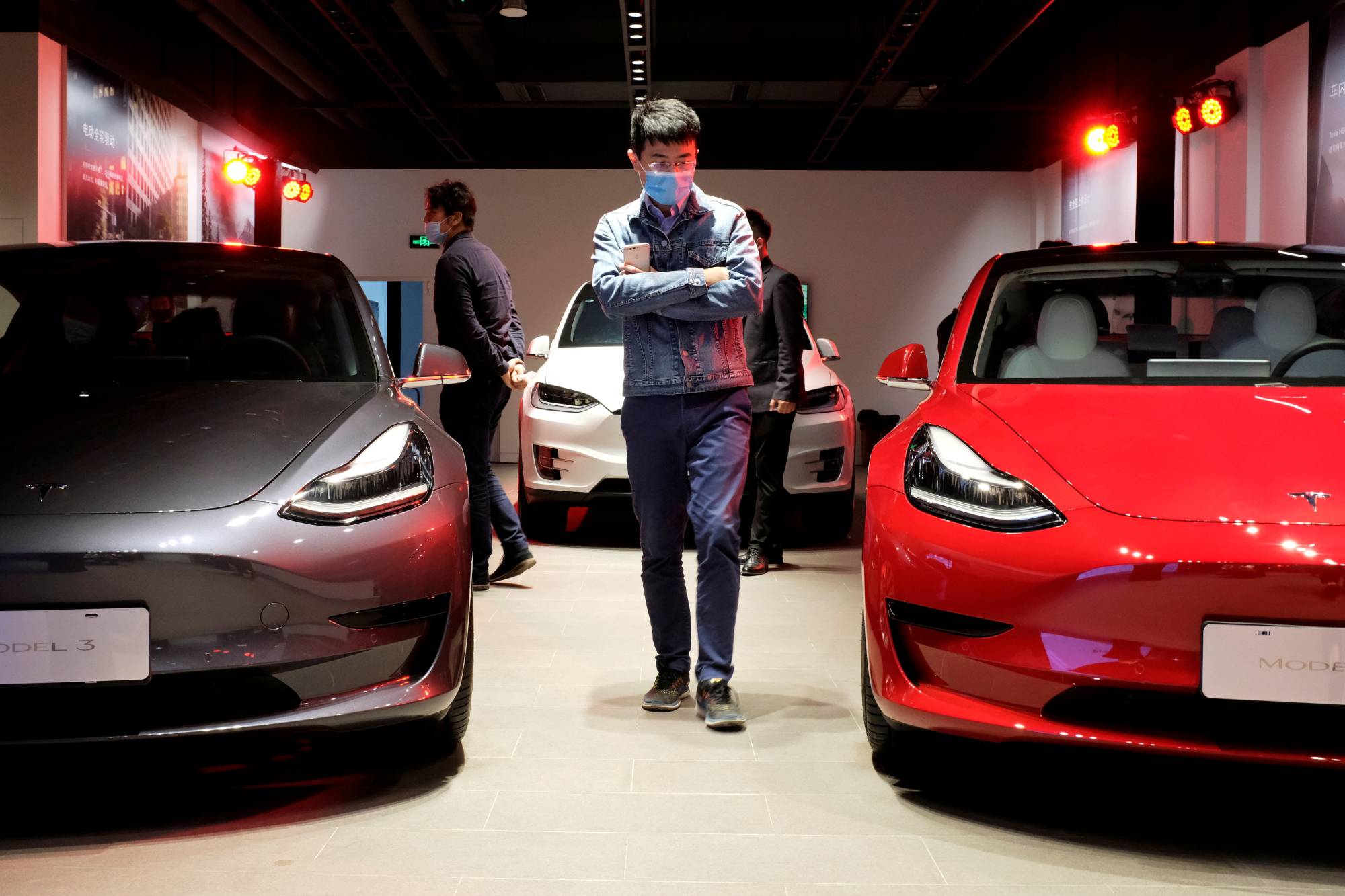 A Tesla showroom in Shanghai | REUTERS 