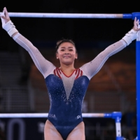 Sunisa Lee performs during the women\'s all-around at the Tokyo Olympics on Wednesday. | REUTERS