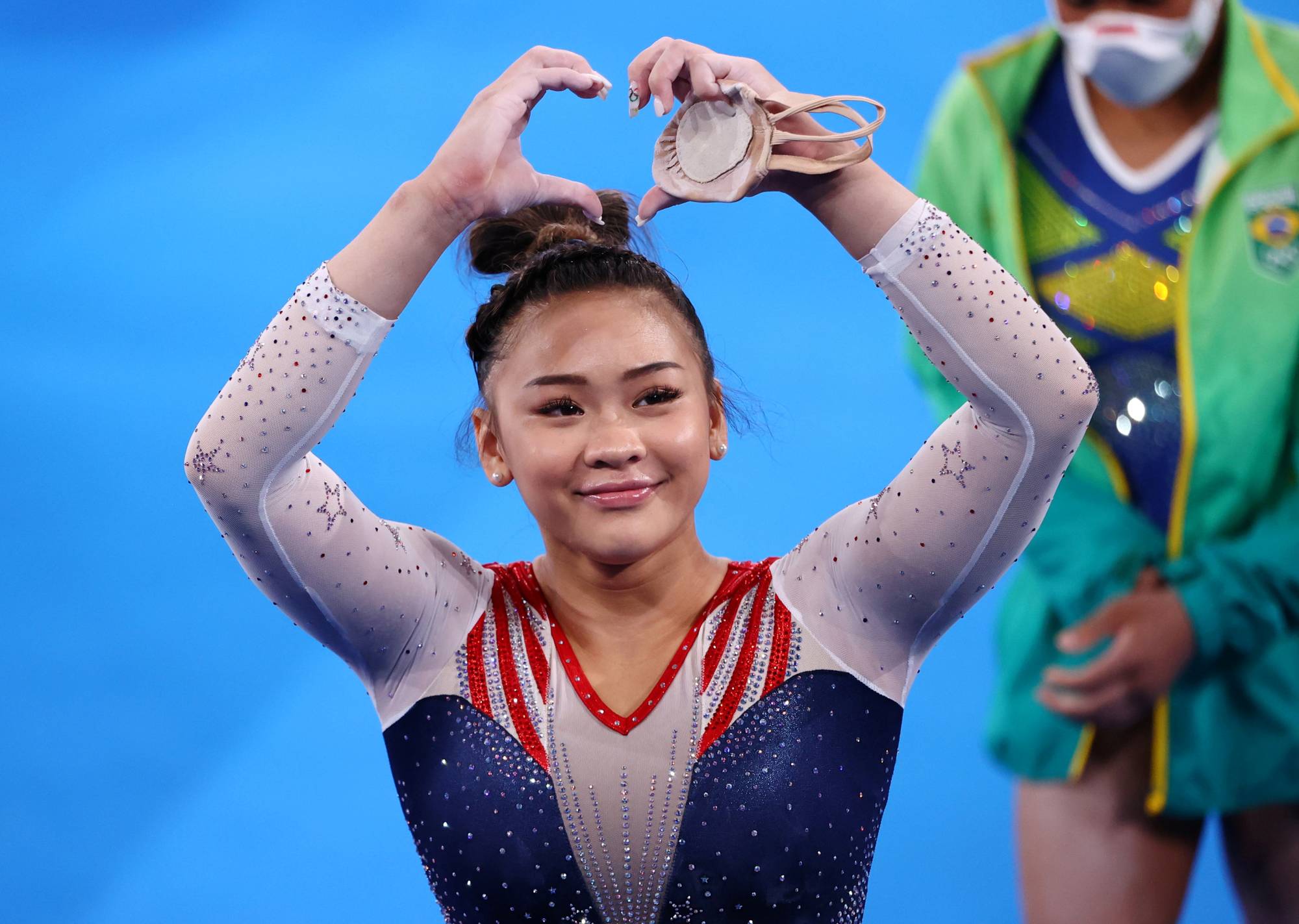 Out from the shadows and into the spotlight U.S. gymnast Sunisa Lee
