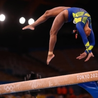 Brazil\'s Rebeca Andrade competes in the balance beam event of the artistic gymnastics women\'s all-around final. | AFP-JIJI