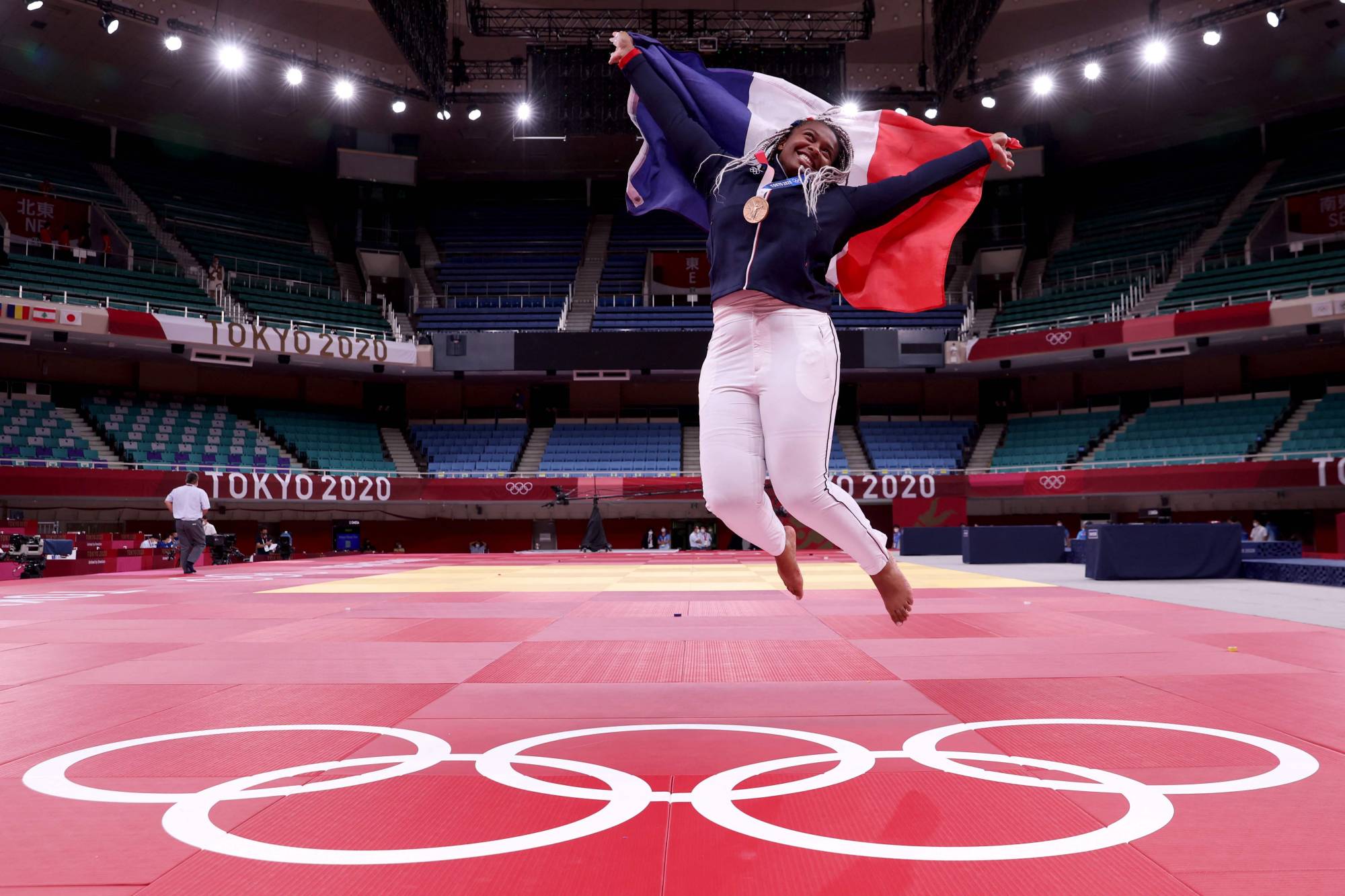 France's Romane Dicko jumps for joy after receiving the bronze medal in women's 78-kilogram judo women's in Nippon Budokdan. | AFP-JIJI