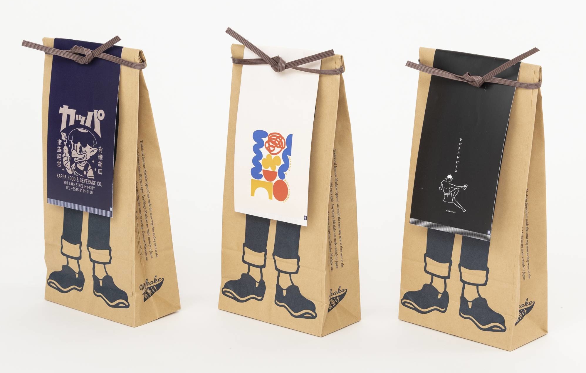 The paper packaging for Anything Co. Ltd.’s maekake, featuring a label shaped as an apron, was created by Japanese design unit Nosigner. | HIROYUKI HARA 