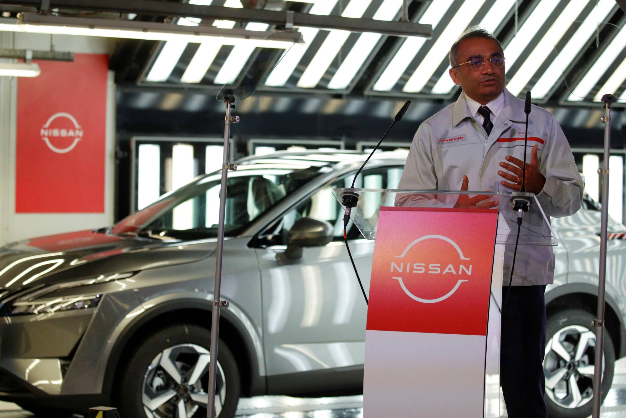 Ashwani Gupta, Nissan's chief operating officer, speaks during a news conference at Nissan's Sunderland plant in Sunderland, England, on Thursday. | REUTERS