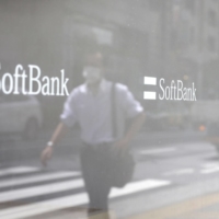 SoftBank Corp. has sold about $12.7 billion of bonds this year, making it the biggest junk-rated corporate issuer of debt in the world in the first half, according to data compiled by Bloomberg. | BLOOMBERG