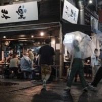 An izakaya pub in the Ameya Yokocho area of Tokyo on Friday night | BLOOMBERG