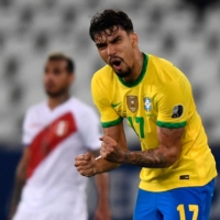 Brazil\'s Lucas Paqueta celebrates after scoring against Peru during their Copa America semifinal in Rio de Janeiro on Monday. | AFP-JIJI