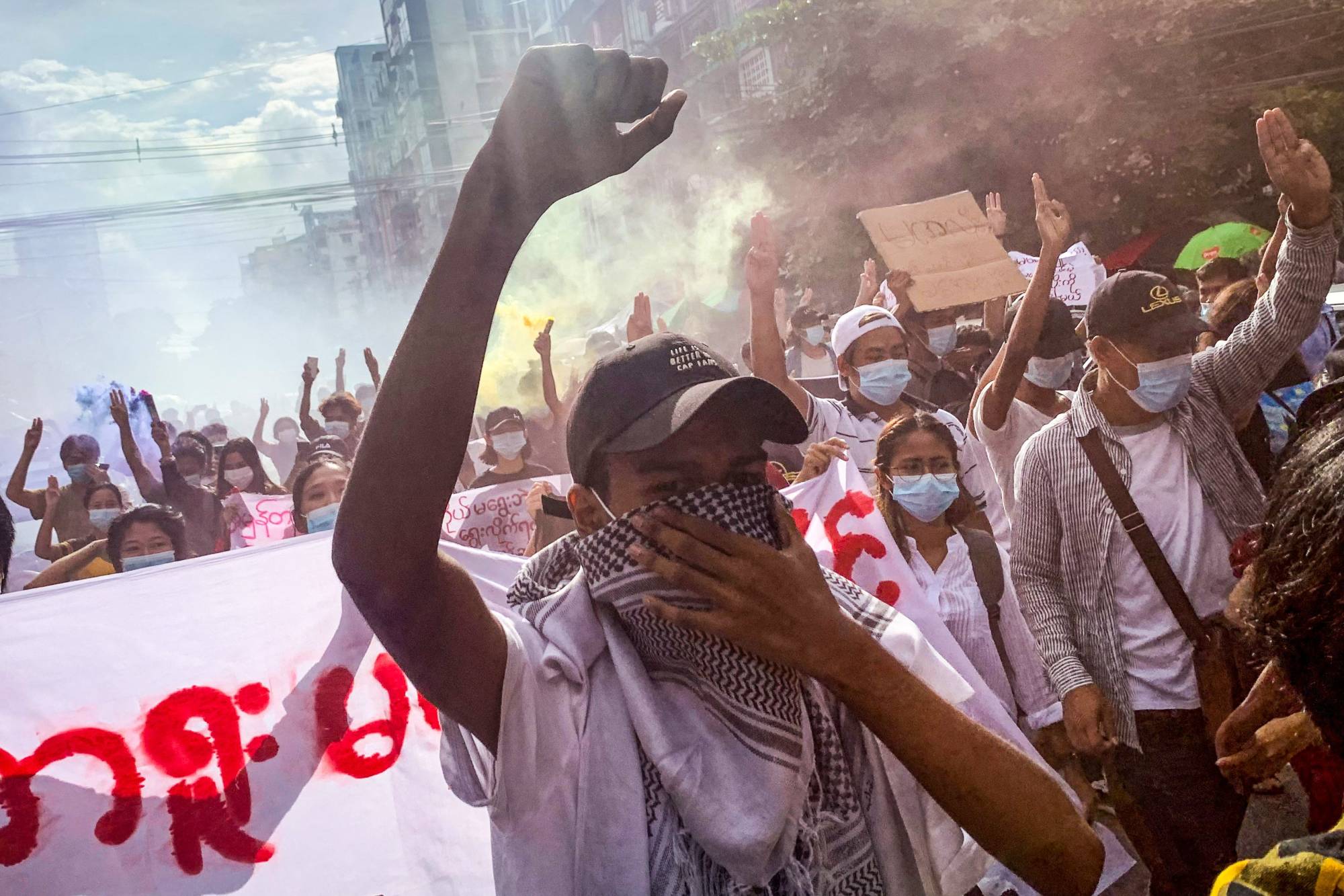 Protesters take part in a demonstration against the military coup in Yangon on Saturday.  | AFP-JIJI