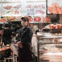 Most of the economists surveyed by Bloomberg said Prime Minister Yoshihide Suga is likely to announce another economic stimulus package before national elections that must be held by fall. | BLOOMBERG