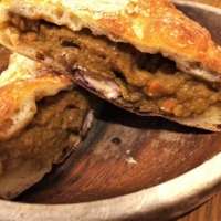 Transparente’s red kidney bean karēpan is like a mini-calzone, hearty and with a quasi-Mexican flair. | RUSSELL THOMAS
