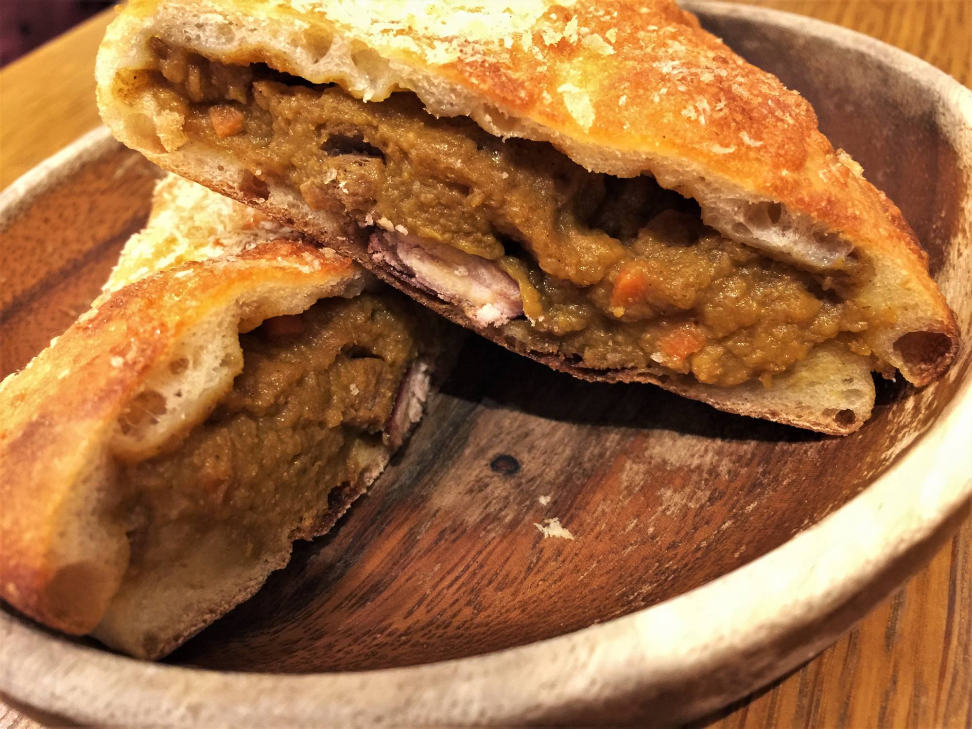 Transparente’s red kidney bean karēpan is like a mini-calzone, hearty and with a quasi-Mexican flair. | Russell Thomas 