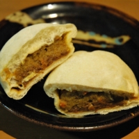 Kinmugi bakes, rather than fries, its karēpan, resulting in a white exterior with a fragrant curry interior. | RUSSELL THOMAS

