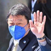 Foreign minister Toshimitsu Motegi arrives at a G20 meeting in Matera, Italy, on June 29. | AFP-JIJI