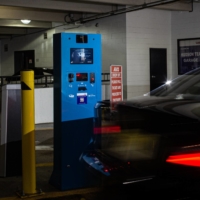 Cameras at a parking garage operated by LAZ Parking in Hoboken, New Jersey, allow cars to pass gates without stopping by identifying payers through their license plates. | ANDY ZALKIN / THE NEW YORK TIMES