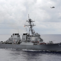The U.S. Navy guided-missile destroyer USS Curtis Wilbur patrols in the South China Sea in 2013. | U.S. NAVY / VIA REUTERS 