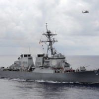 The U.S. Navy guided-missile destroyer USS Curtis Wilbur patrols in the South China Sea in 2013. | U.S. NAVY / VIA REUTERS 